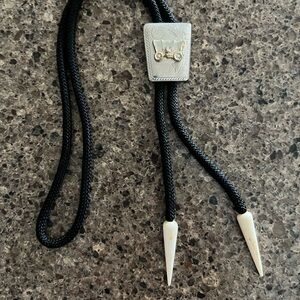 Black Western Bolo Tie with Silver Accents (not sterling silver).